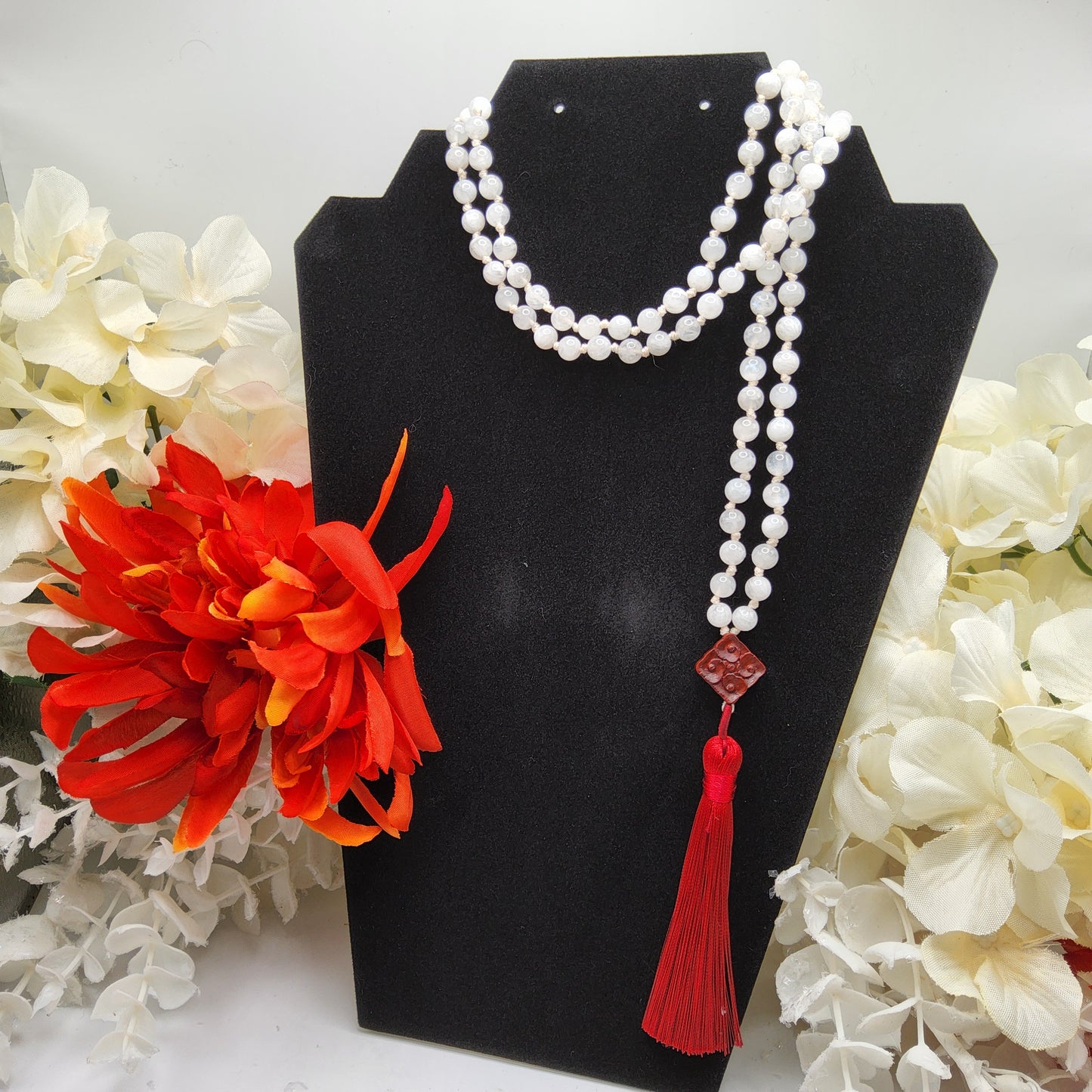 Mala Moonstone 6mm with Sandalwood accent and tassel.