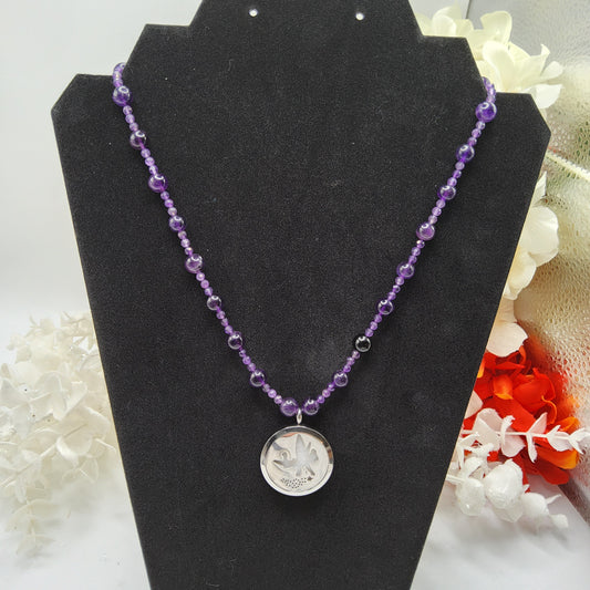 Essential oil Amethyst 7mm and 4mm beads with Fairy pendant 18 inches.