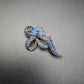 Vintage Blue Rhinestone Brooch Silver tone Ribbon